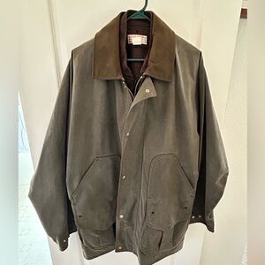 GUC men’s Filson jacket. Waxed cotton shell with removable liner. Size XL.